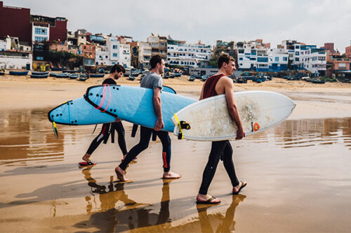 walking with surfboards