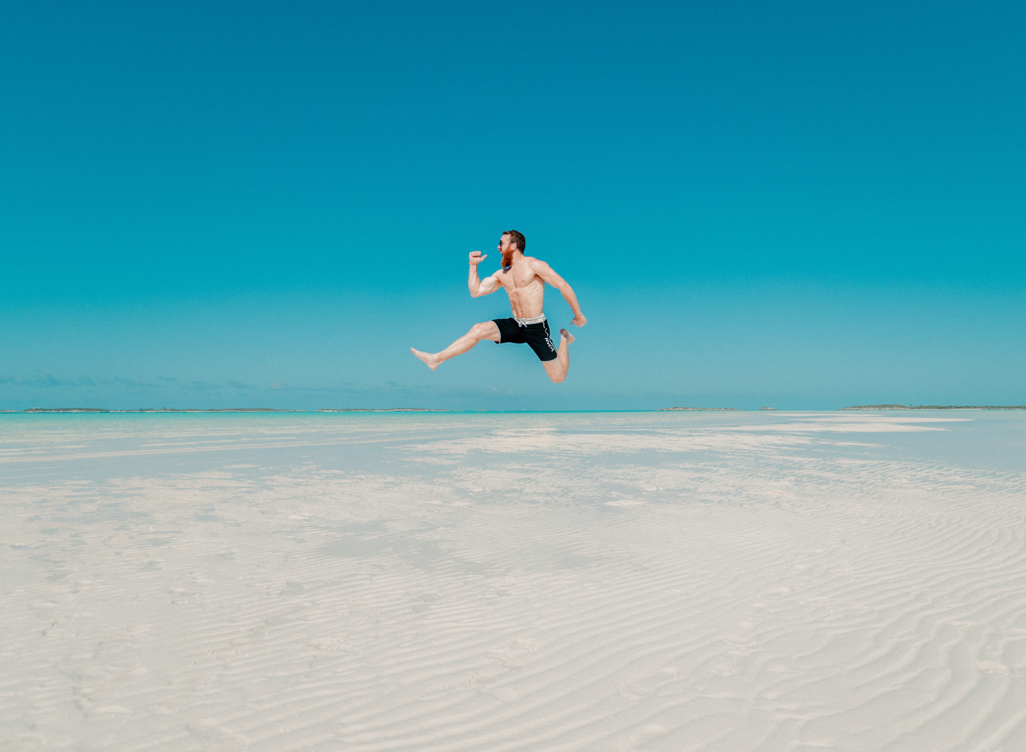 jumping at the beach